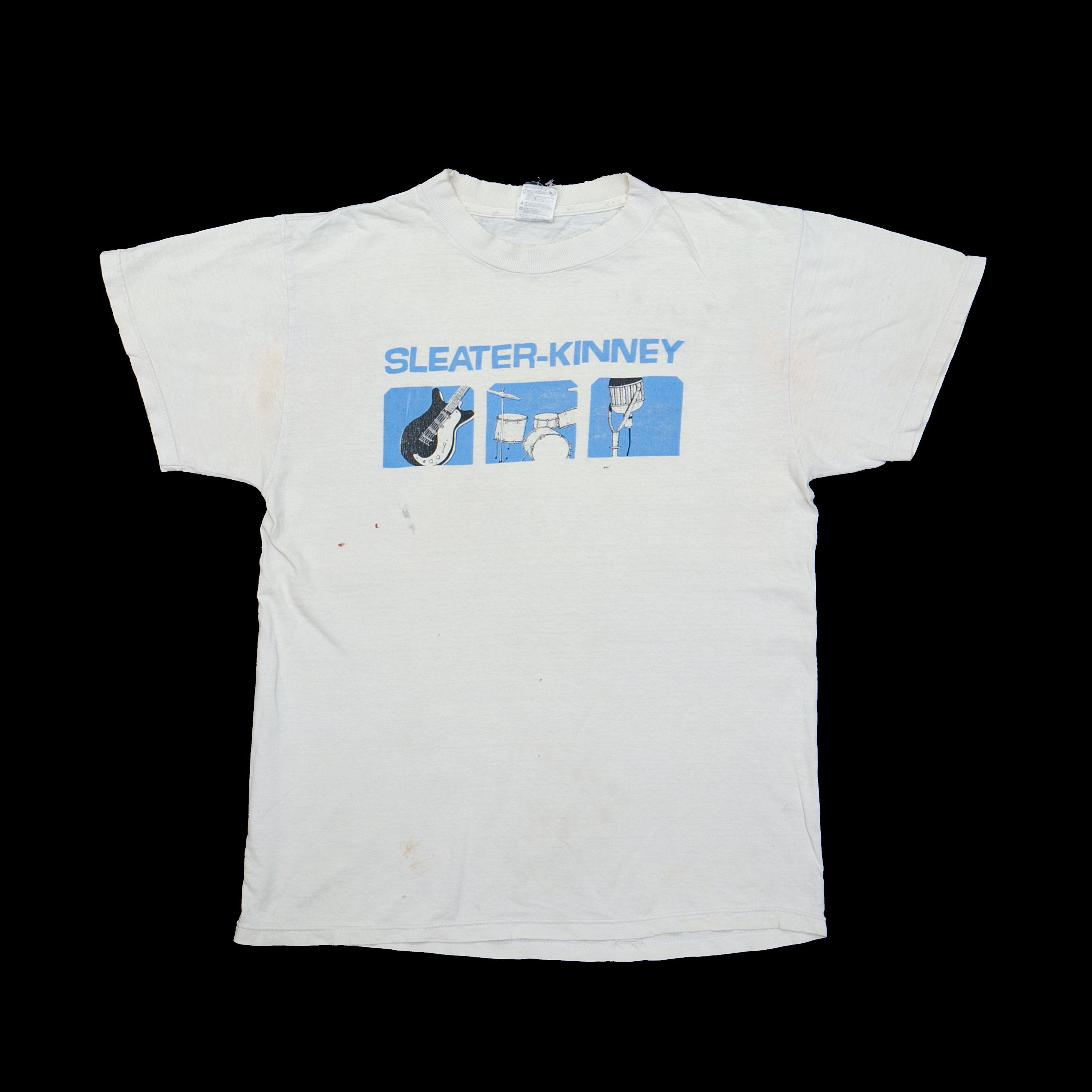 A white t-shirt with a blue design in the center.