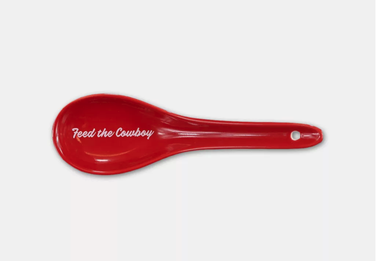 A red spoon with white lettering.