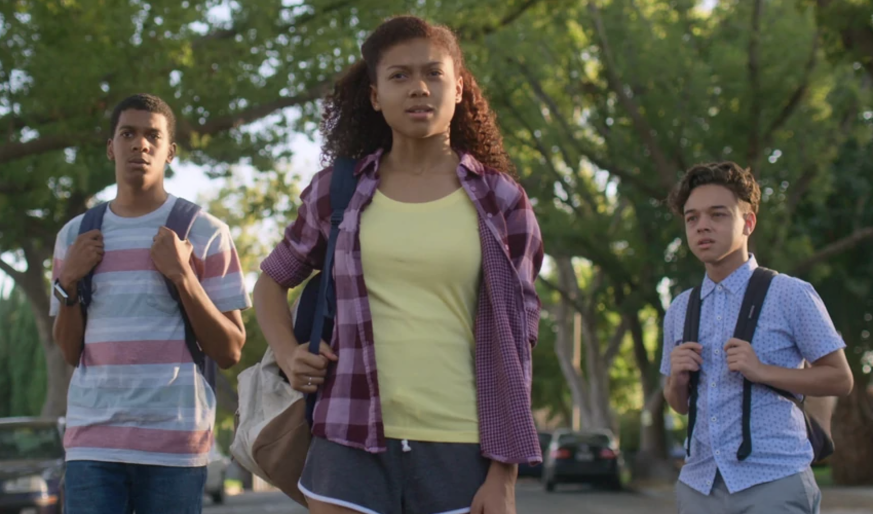 (R to L) Jamal Turner, Monse Finnie, and Ruby Martinez realize their friend, Cesar Díaz, has been jumped into the Santos gang