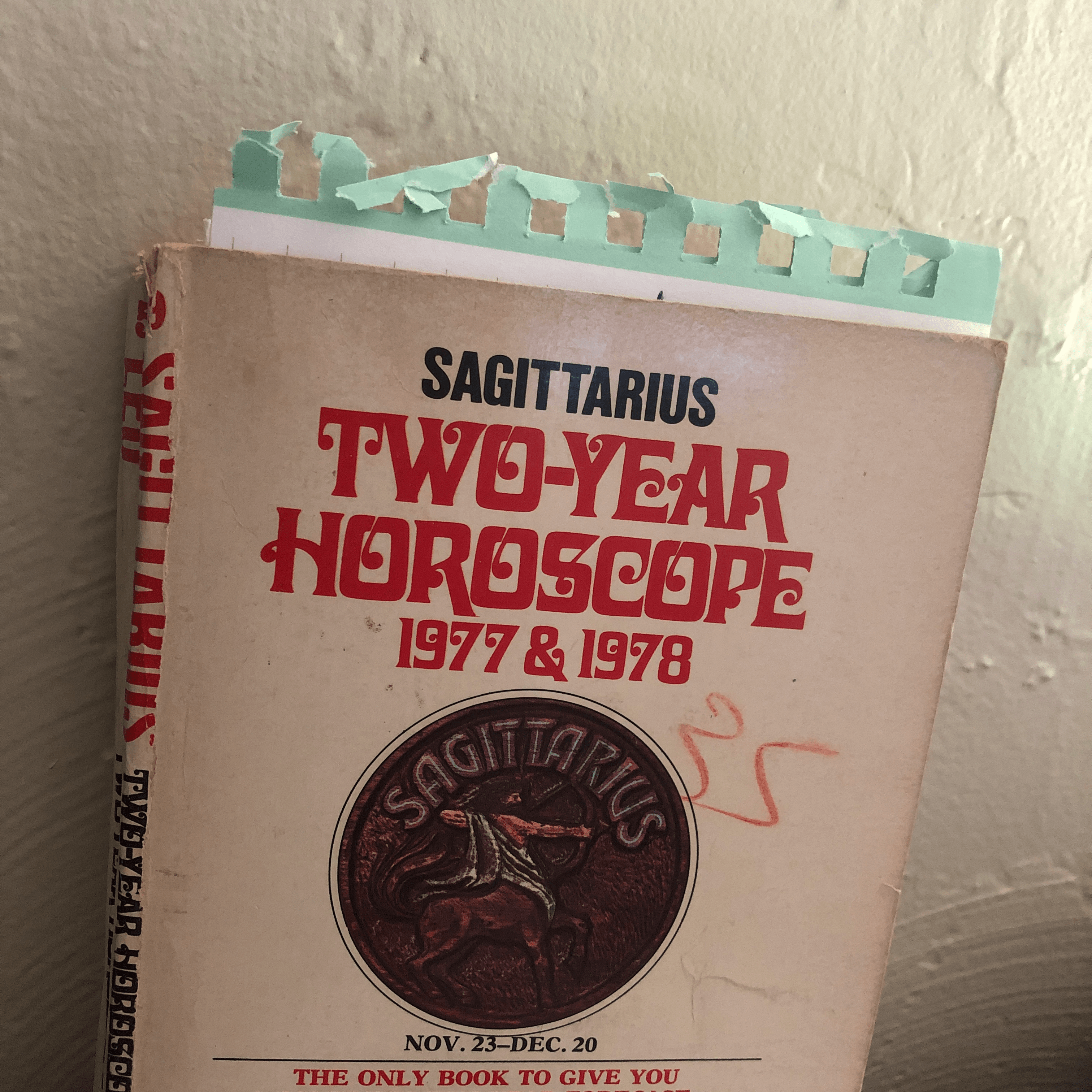 The front of an old book with the title Sagittarius Two-Year Horoscope 1977 & 1978