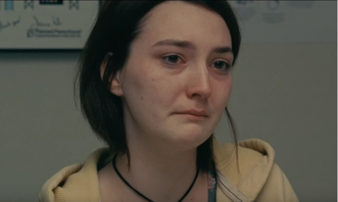 Close up of a woman in a doctor's office from the film Never Rarely Sometimes