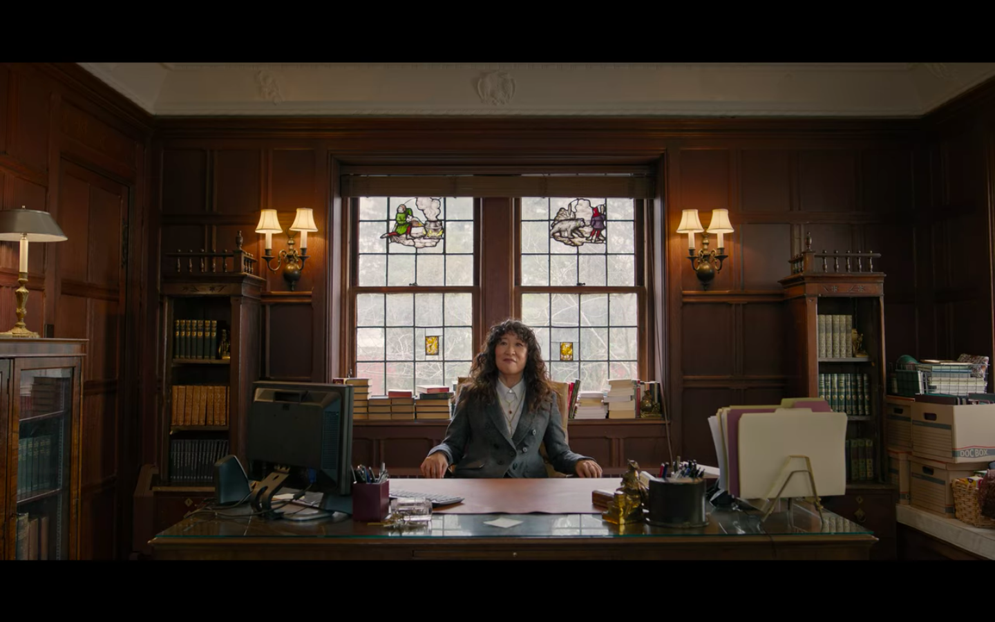 Ji-Yoon Kim sits in her new office as English Department chair at an Ivy League University
