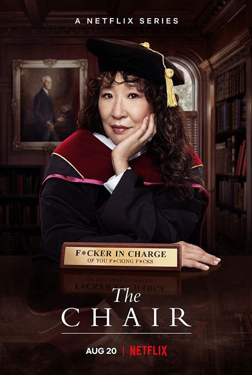 Sandra Oh wears a cap and gown indicating her place in higher education