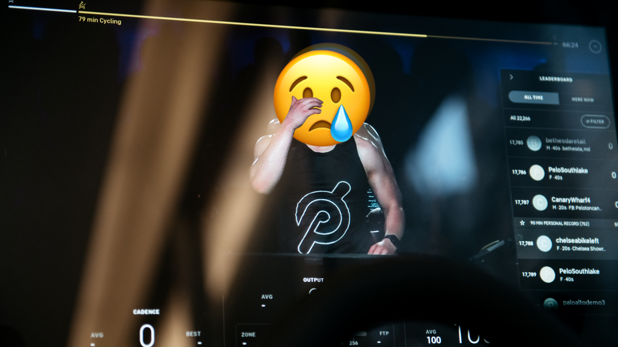 Image of a Peloton instructor on a Peloton bike with a crying emoji as the person's face.