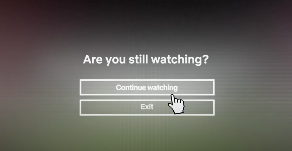 A mourse cursor hovers over the Continue Watching option on Netflix's Are You Still Watching? notification