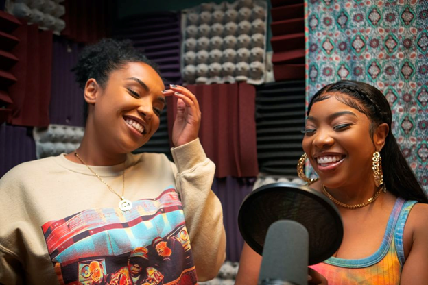 Shawna and Mia from Issa Rae's Rap Sh!t in a recording booth