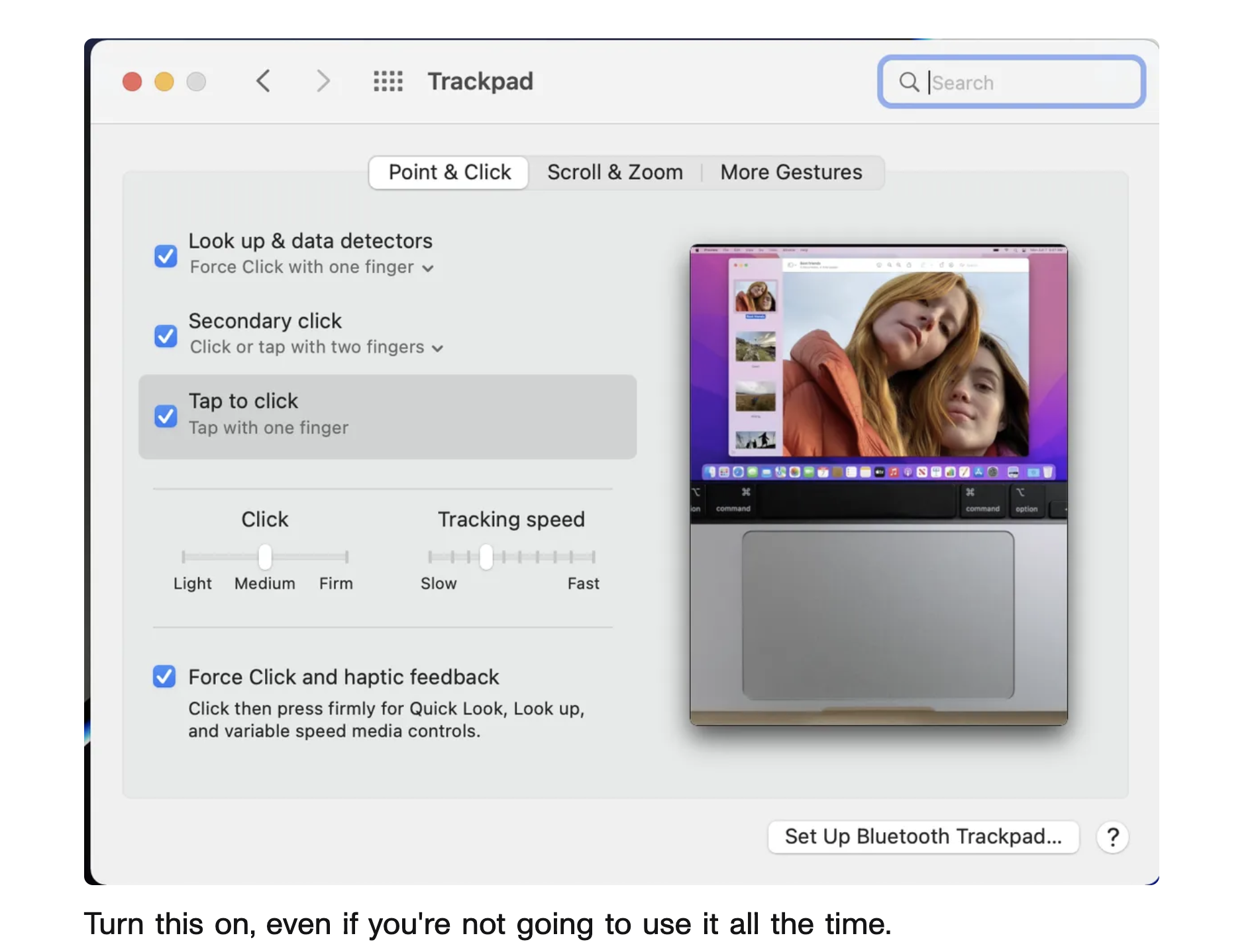 Apple System Preferences Window with Trackpad and Two Women and Caption
