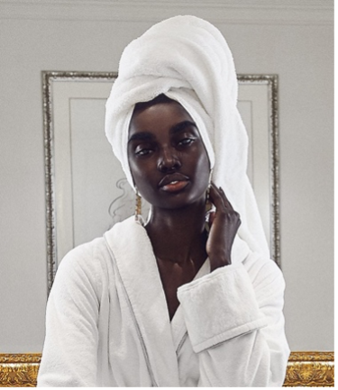 Figure 3a. Shudu in a bathrobe and towel headwrap.