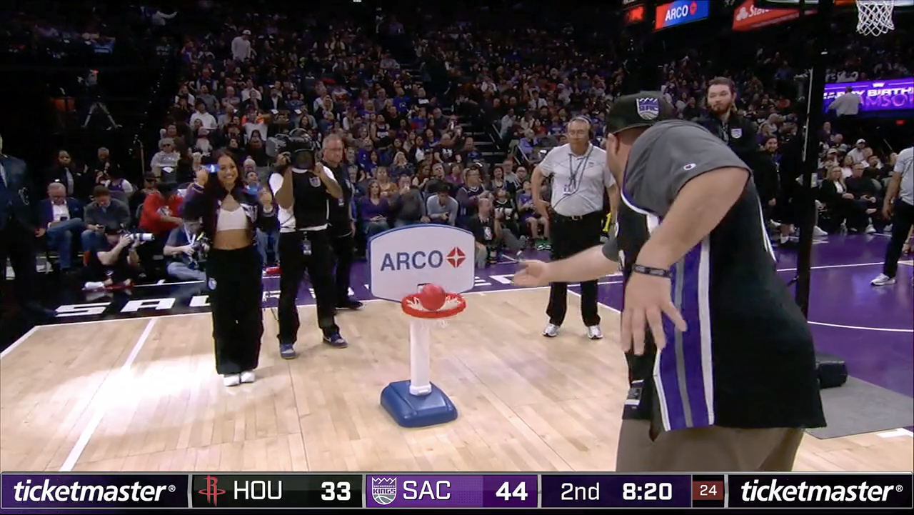 A fan attempts to win a gas gift card during a Sacramento Kings home game