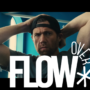 Over*flow title over image of Billy Eichner in backwards hat in Bros